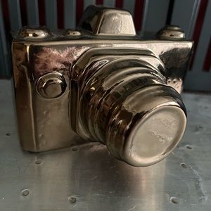 Porcelain camera sculpture